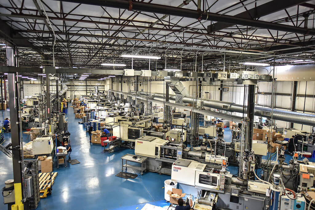 birdseye view of factory floor with injection machines