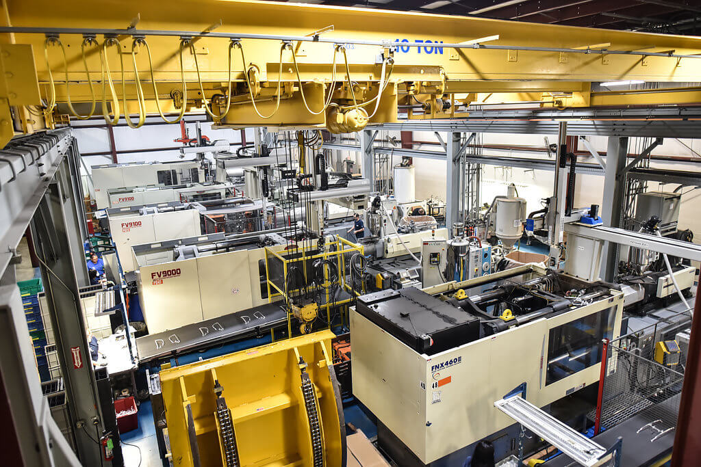 birdseye view of factory floor with injection machines