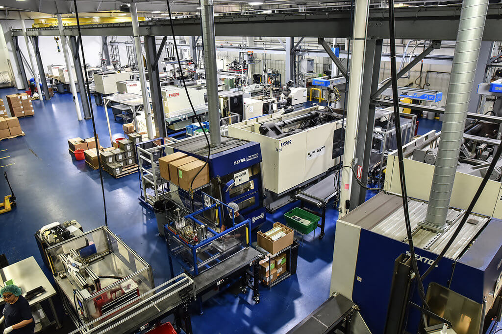 birdseye view of factory floor with injection machines