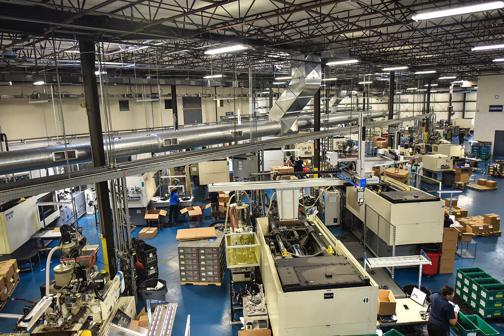 birdseye view of factory floor with injection machines